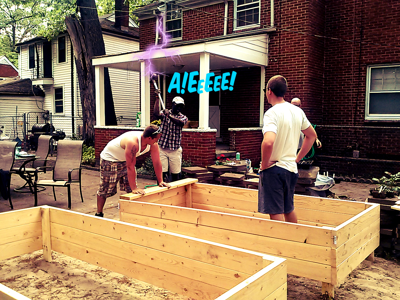 Building the original raised beds — community showing up together in Detroit, 2014